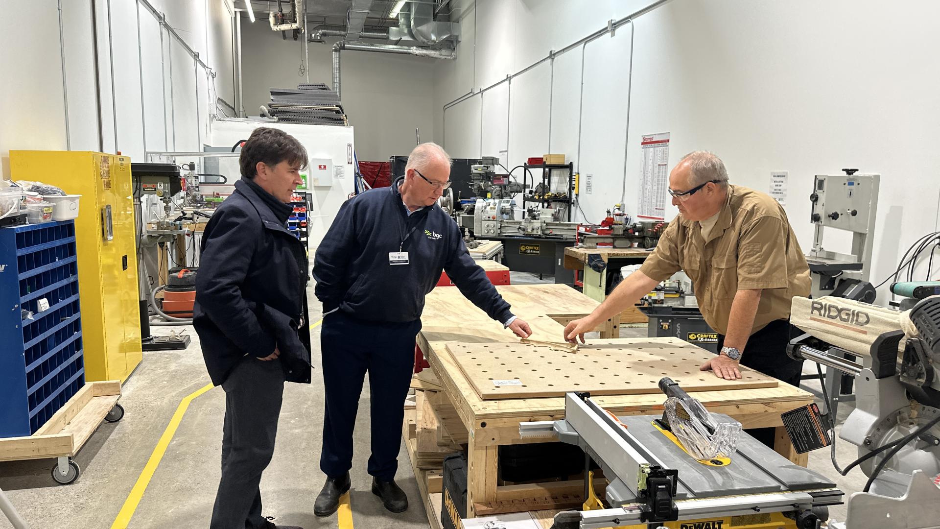 Technicians discussing work in an industrial building